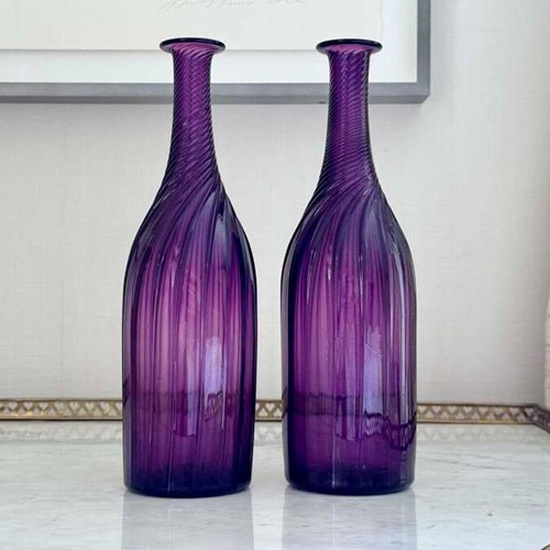 Pair Victorian amethyst wrythen glass bottle decanters C1850