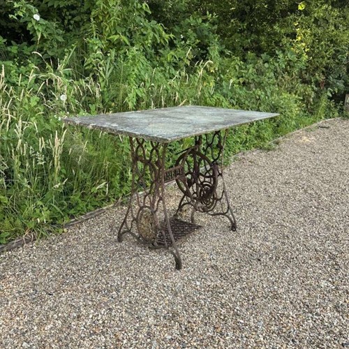 Patinated Marble and Iron Table