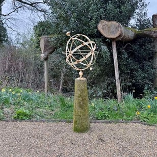 Iron Armillary on Carved Stone Base...