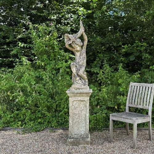 Patinated Shell Boy Fountain on Tall Pedestal