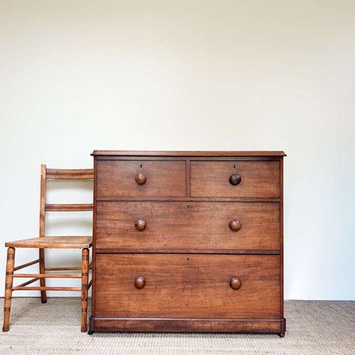 Antique 2 Over 2 Chest of Drawers on Caster Feet