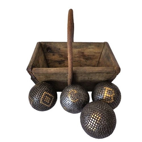 Four Studded Boules In Wooden Panier