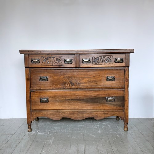 Chest Of Drawers With Decorative Carved Detail