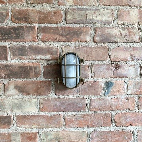 Contemporary Small Aged Brass Oval Bulk Head Wall Lights