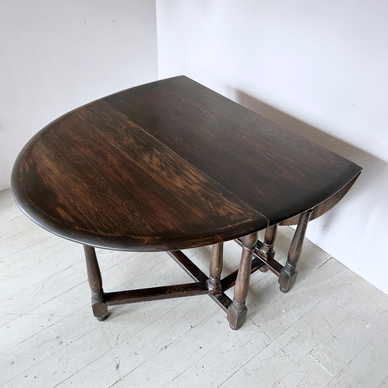 Dark Stained Solid Wood Oval Drop Leaf Table-agapanthus-interiors-dark-stained-solid-wood-oval-drop-leaf-table-10-main-638011804213917140.jpeg