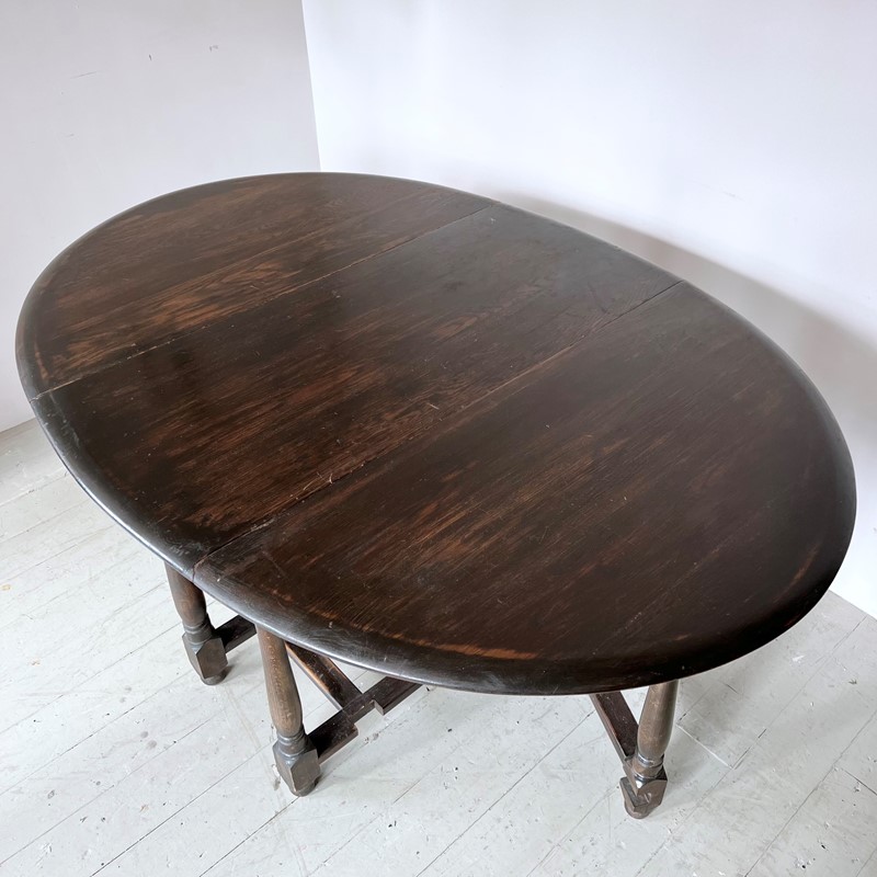 Dark Stained Solid Wood Oval Drop Leaf Table-agapanthus-interiors-dark-stained-solid-wood-oval-drop-leaf-table-4-main-638011804310946705.jpeg