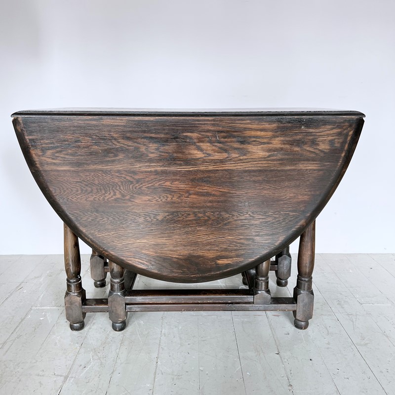 Dark Stained Solid Wood Oval Drop Leaf Table-agapanthus-interiors-dark-stained-solid-wood-oval-drop-leaf-table-7-main-638011804116730233.jpeg