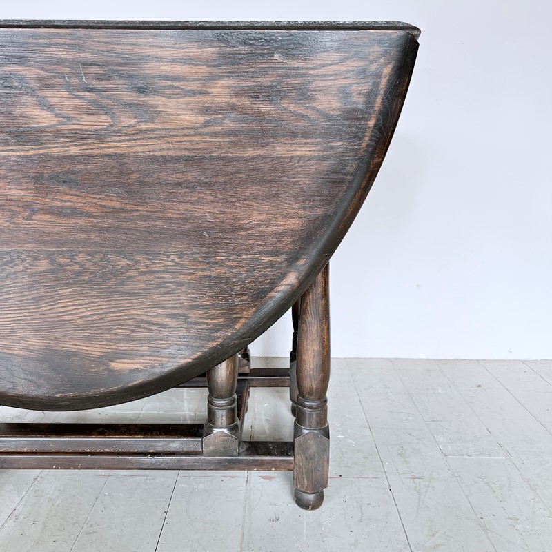 Dark Stained Solid Wood Oval Drop Leaf Table-agapanthus-interiors-dark-stained-solid-wood-oval-drop-leaf-table-8-main-638011804149542808.jpeg