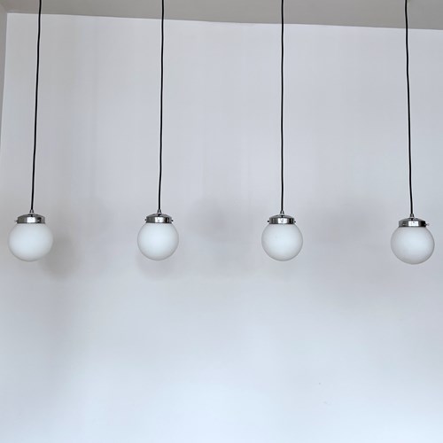 Four White Matte Globe Shades