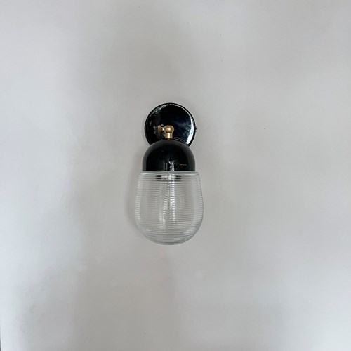 Contemporary Wall Light, Black Wall Fitting With Clear Ribbed Glass Shade