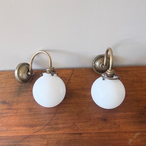 Newly Made Brushed Brass Wall Lights With Contemporary Globe Shades