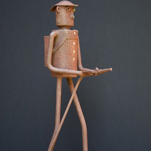 Tall Folk Art Metal Fireman