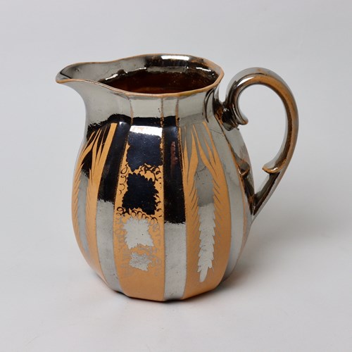 Unusual Silver Lustre Jug On Orange Ground