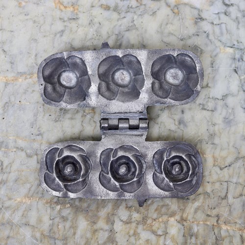 Pewter Mould In The Shape Of Three Small Roses