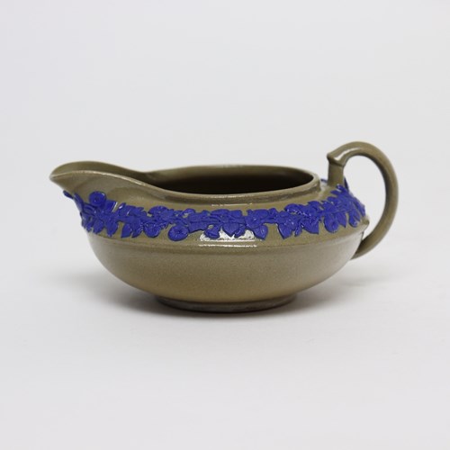 Wedgwood, Glazed Drabware Jug With Blue Relief