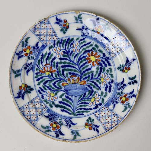 Polychrome Delft Plate Decorated With A Floral Design