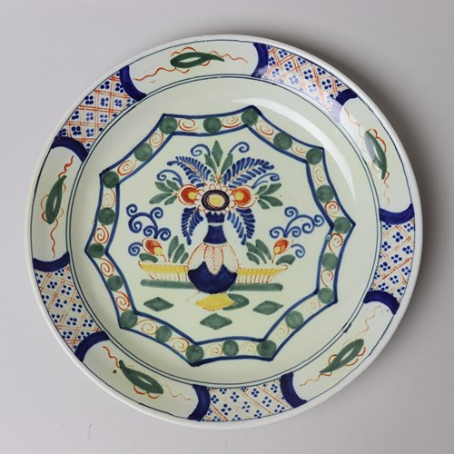 Polychrome Delft Plate Decorated With A Vase Of Flowers