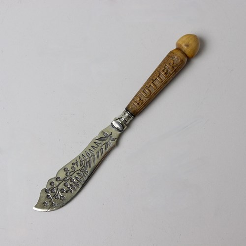Silver Plated Butter Knife With Carved Wooden Handle