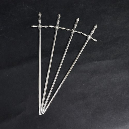 Set Of Hatelet Skewers Shaped As Swords