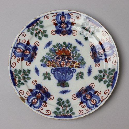 Delft Plate Decorated With An Urn Of Flowers