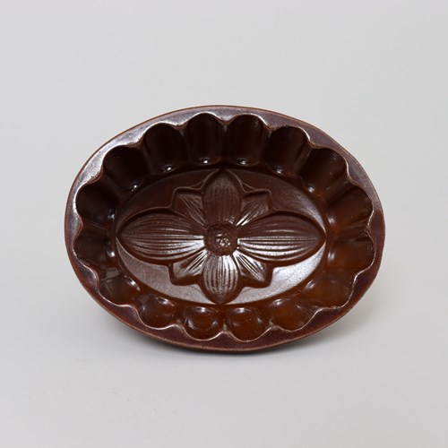 Brown Saltglaze Jelly Mould With Stylised Flower Design