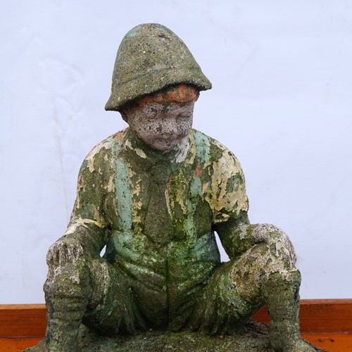 Stone Figure Of A Boy