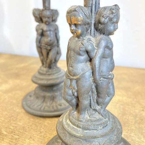 Pair Of Antique Cherub Candlesticks
