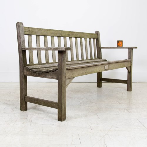 A Weathered Teak Garden Seat Bench By Lister