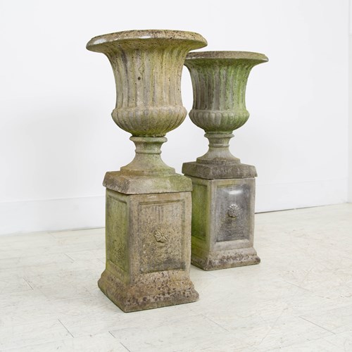 Pair Of Weathered Garden Urns Planters On Plinths