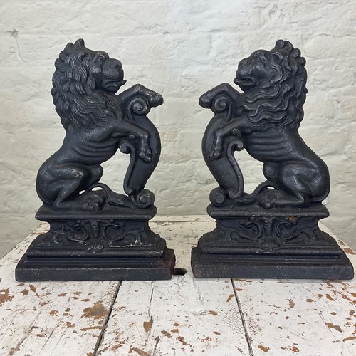 An Opposing Pair Of 19Th Century Cast Iron Rampant Lion Door Porters