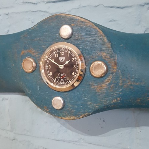 Old Propeller with a Vintage Clock Insert
