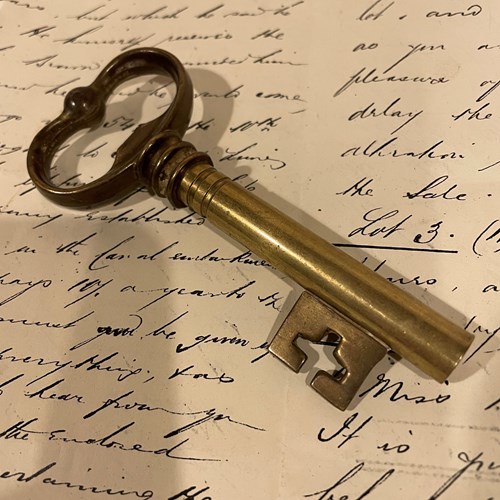 A Brass Corkscrew In The Shape Of A Key