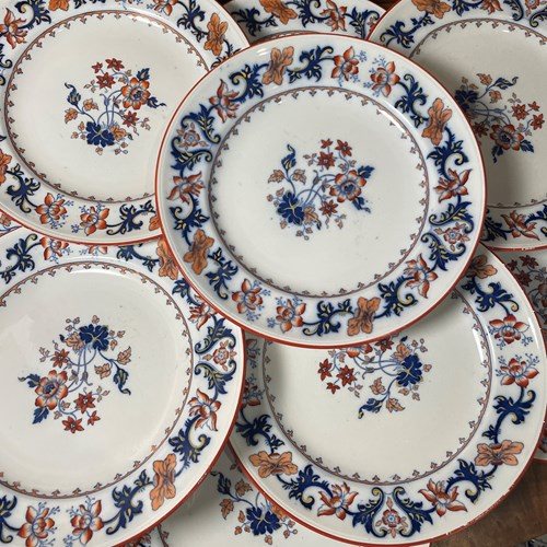 A Set Of 9 Mintons Ironstone Plates