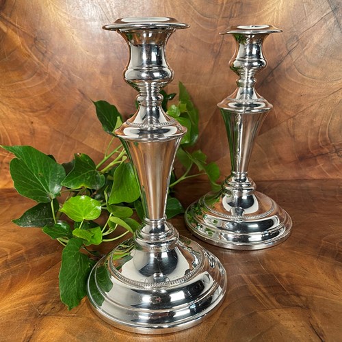 A Large Pair Of Silver Plated Candlesticks
