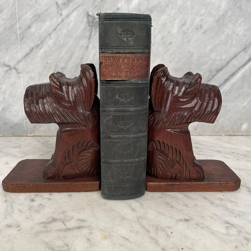 A Pair Of Carved Dog Bookends