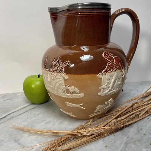 A Large Stoneware Harvester Jug