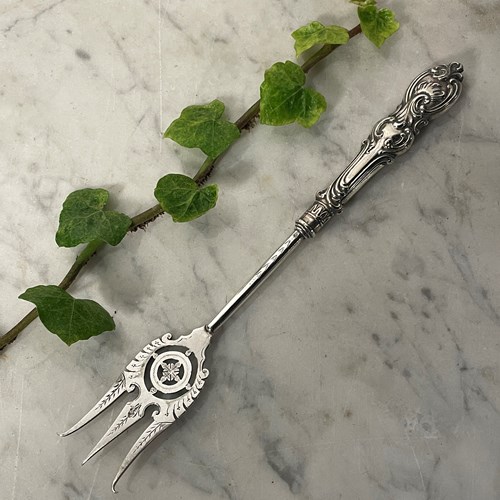 A Large Silver Plated Serving Fork