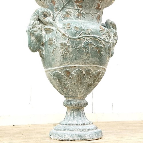 A Large Decorative Plaster Of Paris Cherub & Rams Head Urn Vase 