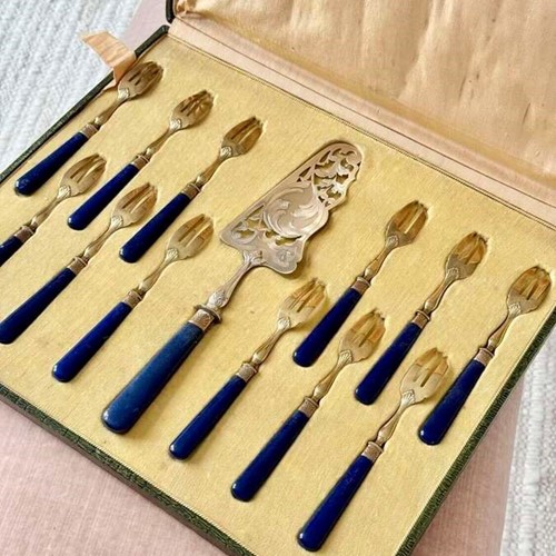 Pretty Art Deco brass & cobalt bakelite cake serving fork set