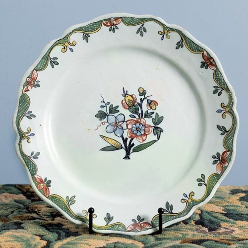 Rouen Faience Plate With Flowers And Ornate Frieze
