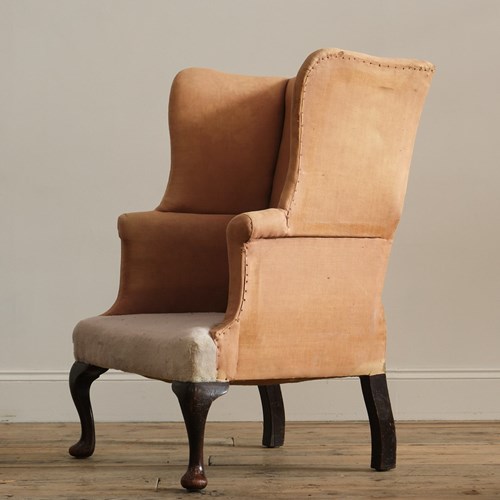 A Good 19Th Century Country House Wingback Armchair. Raised On Tall Cabriolet Fr