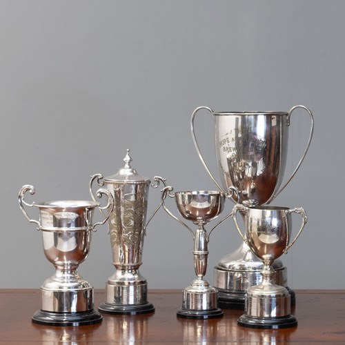 Collection Of 5 Silver Plated Trophies