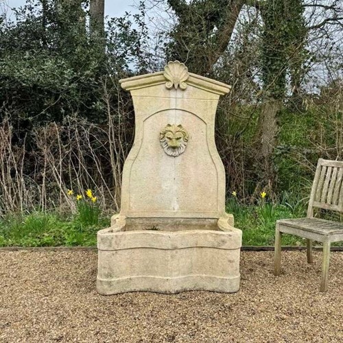 A large Faux Stone Wall Fountain