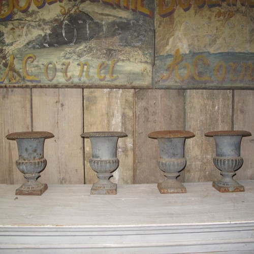 Four 19Th Century Cast Iron Garden Urns