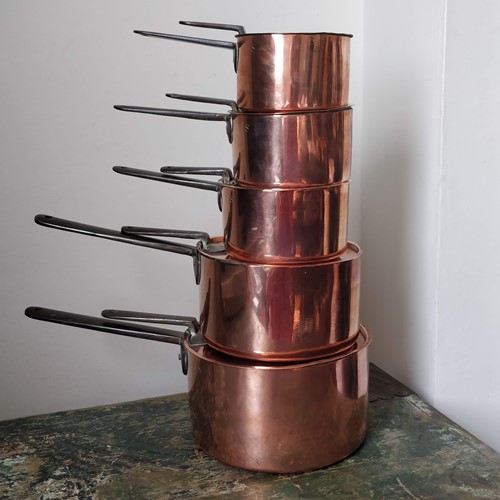 Five English Copper saucepans stamped I.S