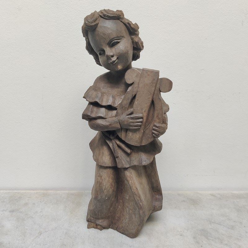 Carved Wooden Cherub Playing A Lyre-general-store-no-2-3-main-638342608592696142.jpg