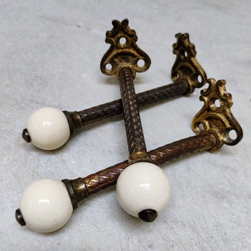 Late 19Th Century Trio Of Brass And Ceramic Hooks