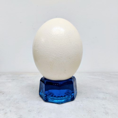 Antique Ostrich Egg On Blue Glass Stand
