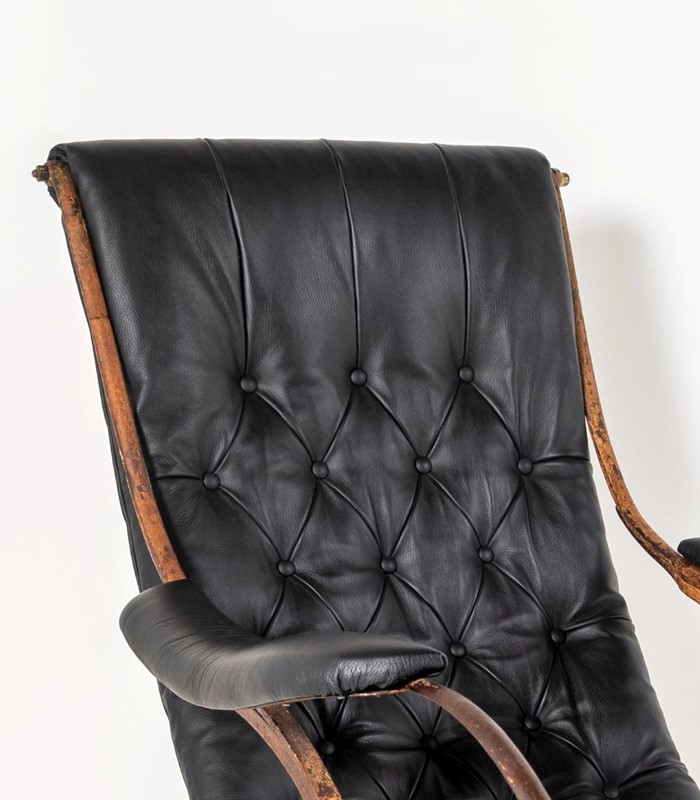 Antique iron frame rocking chair by r w winfield -greencore-design-3-main-637650541009359132.jpg