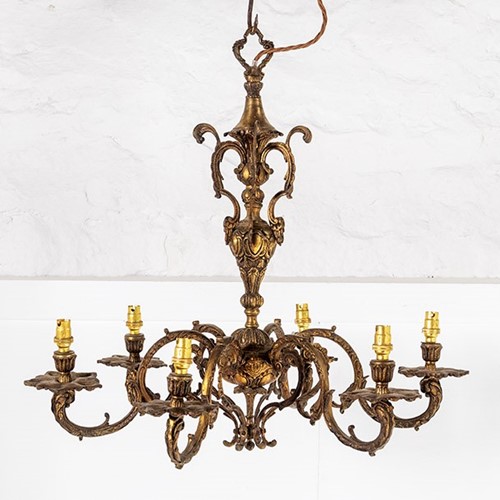 Gilded cast bronze six arm chandelier